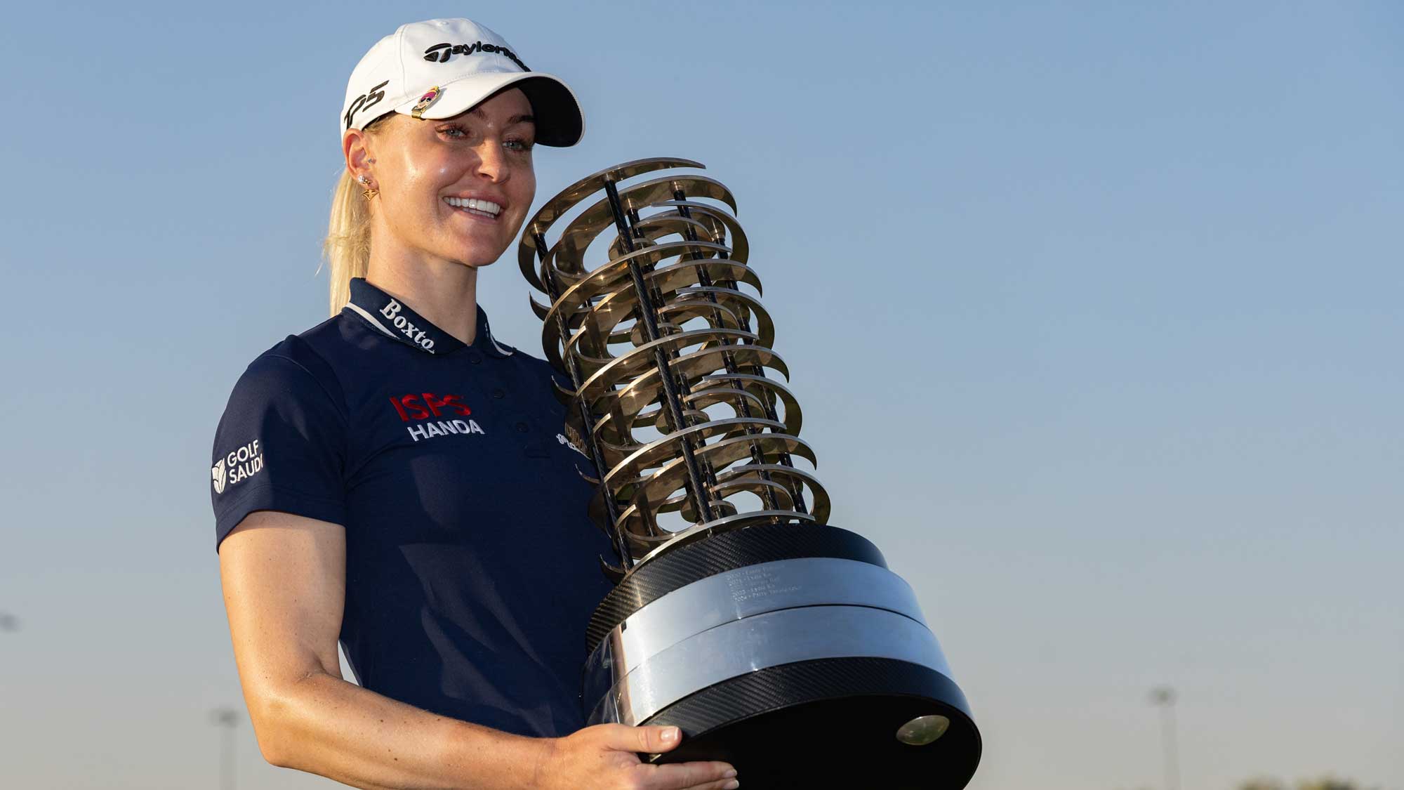 Charley Hull poses with the trophy after winning the PIF Saudi Ladies International on the Ladies European Tour.