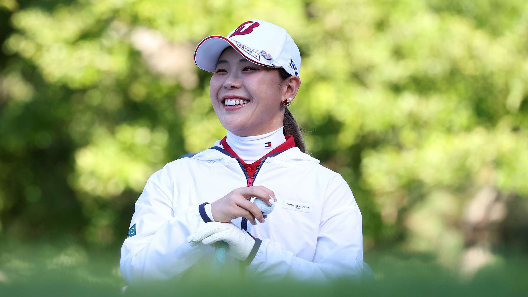 Yuri Yoshida of Japan reacts as she waits to play a shot from the second tee during the first round of the BMW Ladies Championship 2026 at Pine Beach Golf Links on October 22, 2026 in Haenam, South Korea.