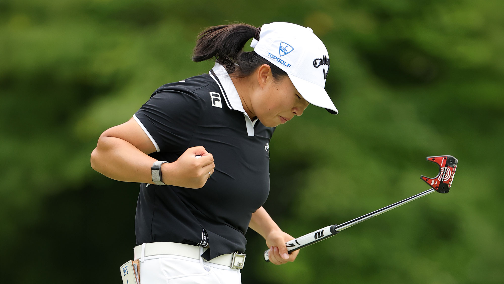 Ruoning Yin of China reacts to her putt on the 18th green during the final round of the FM Championship 2026 at TPC Boston on August 30, 2026 in Norton, Massachusetts.