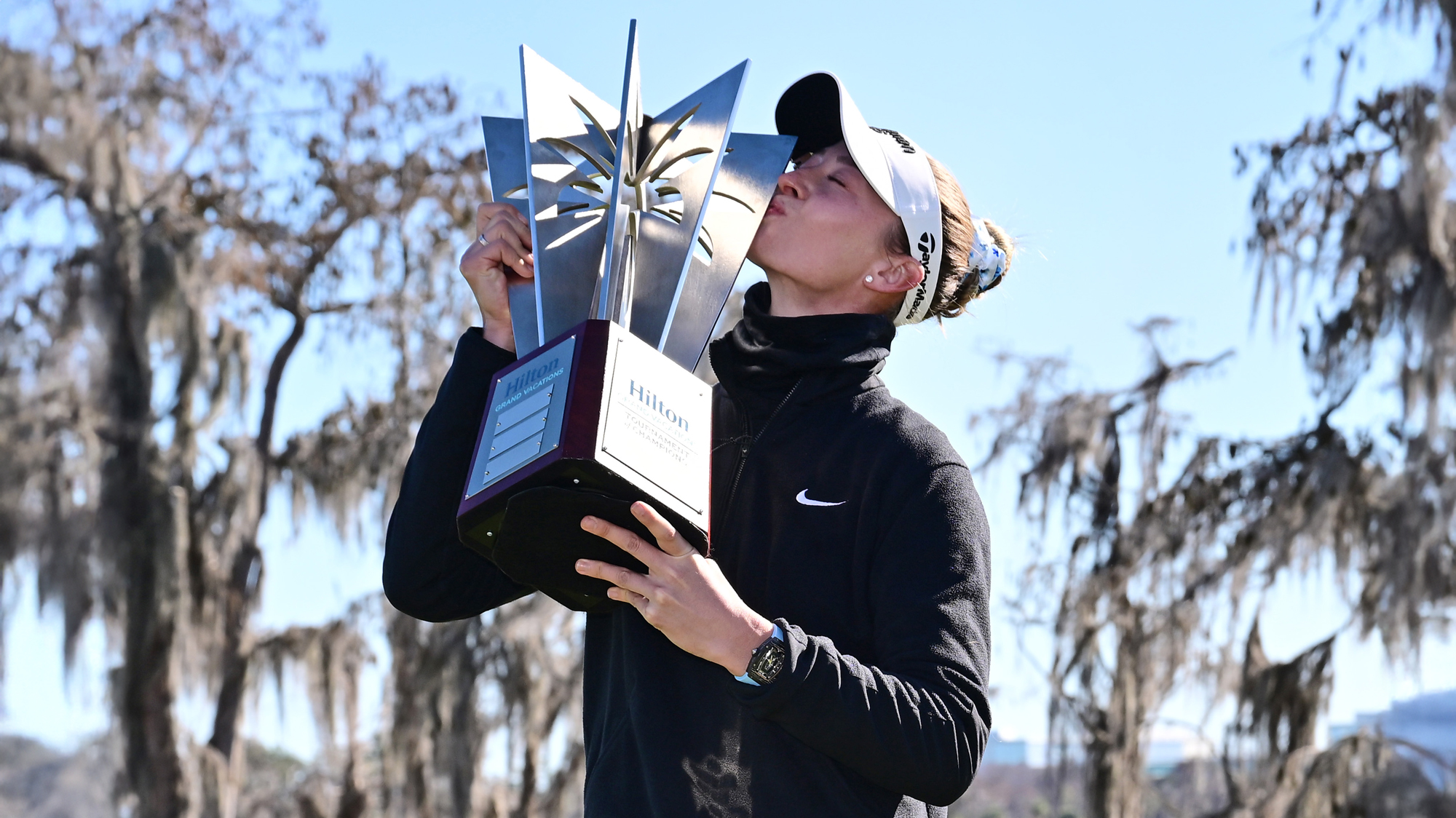Nelly Korda of the United States poses with the trophy following the completion of the third round of the Hilton Grand Vacations Tournament of Champions 2026 at Lake Nona Golf & Country Club on February 1, 2026 in Orlando, Florida. The tournament was shortened to 54 holes due to adverse weather conditions.
