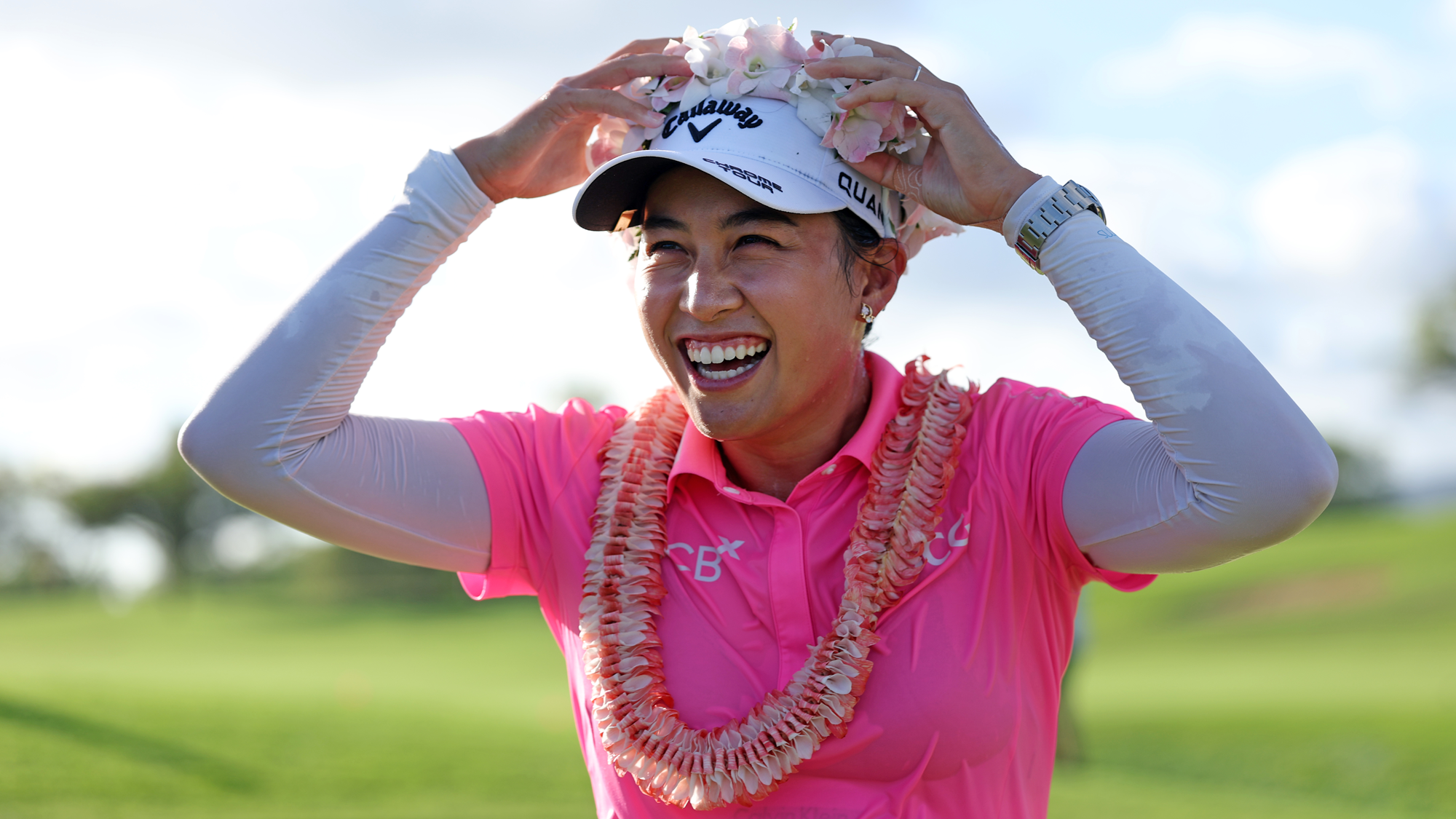 Jeeno Thitikul of Thailand receives a Lei after her winning birdie putt on the 18th green during the final round of the LOTTE Championship presented by Hoakalei 2026 at Hoakalei Country Club on October 04, 2026 in Ewa Beach, Hawaii.