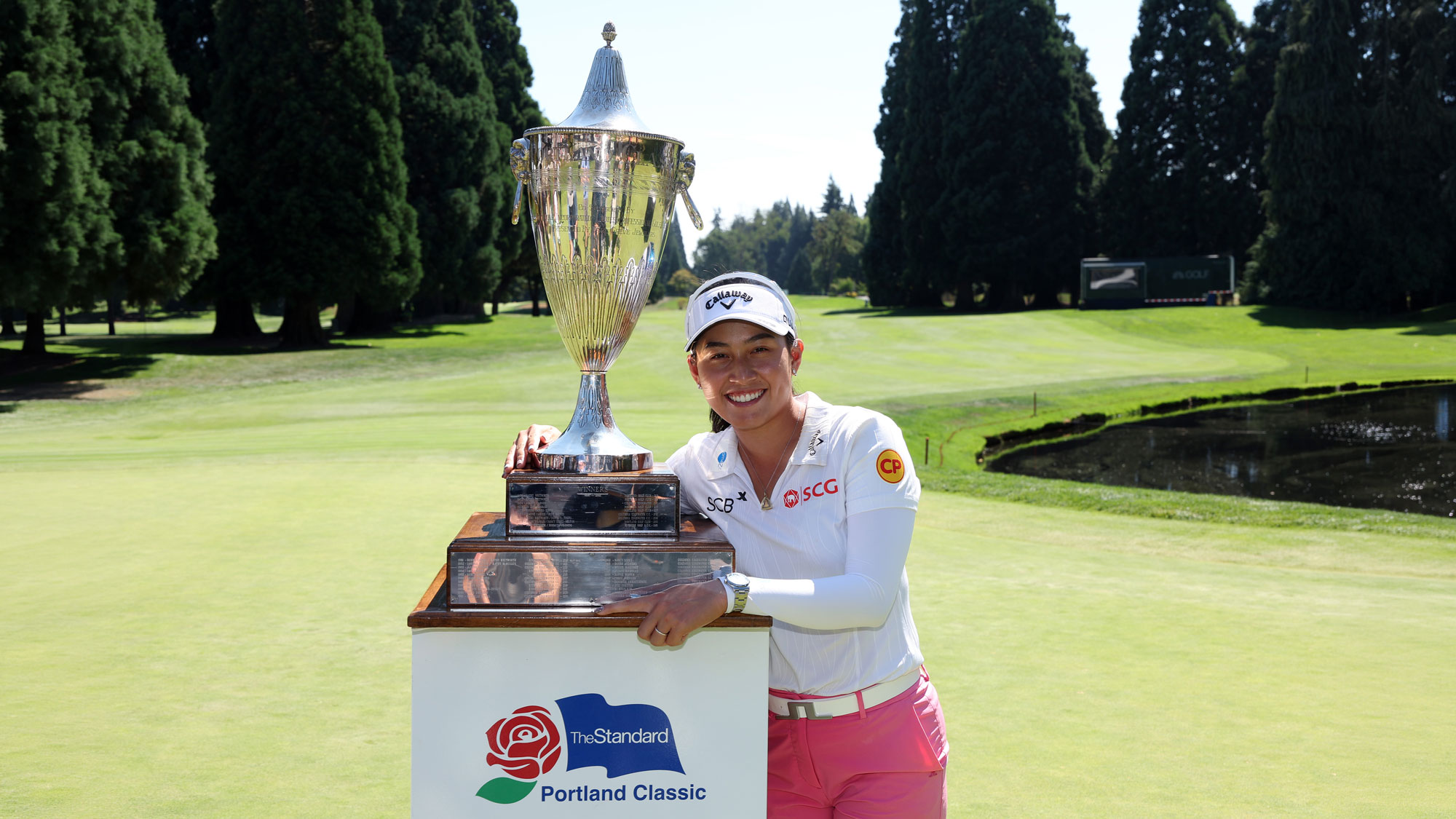 Jeeno Thitikul of Thailand poses with the winner's trophy after winning The Standard Portland Classic 2026 at Columbia Edgewater Country Club on August 16, 2026 in Portland, Oregon.