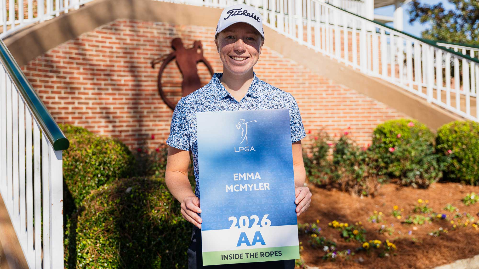 Emma McMyler poses with her LPGA Tour card after the final day of LPGA Qualifying Series Final Qualifying Stage.