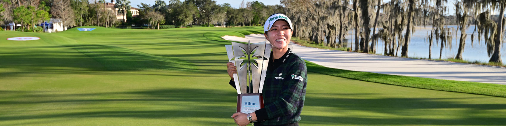 Lydia Ko of New Zealand poses with the trophy after winning the Hilton Grand Vacations Tournament of Champions at Lake Nona Golf & Country Club on January 21, 2024 in Orlando, Florida