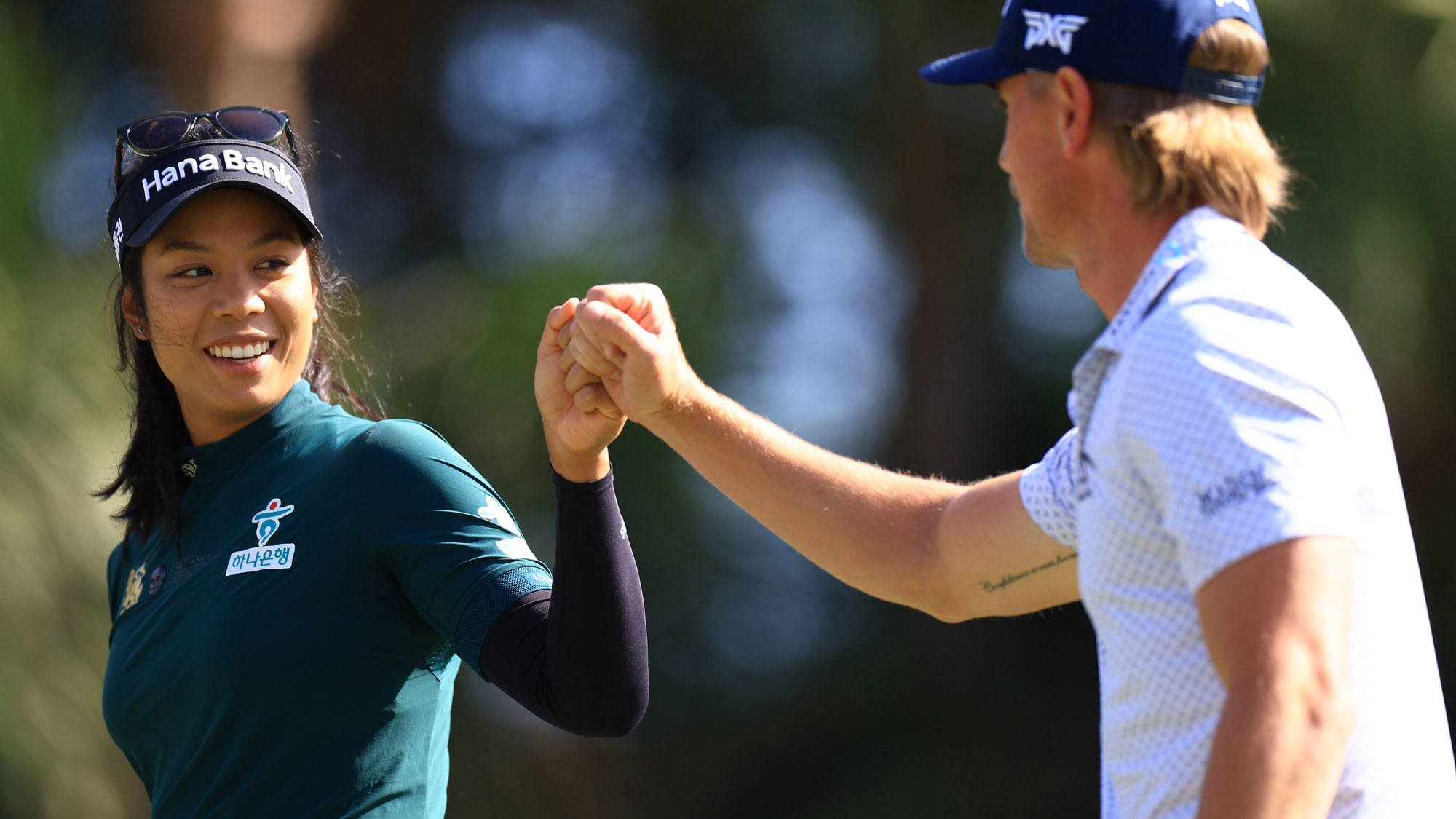 Patty Tavatanakit of Thailand and Jake Knapp of the United States react on the third green during the first round of the Grant Thornton Invitational 2024 at Tiburon Golf Club on December 13, 2024 in Naples, Florida.