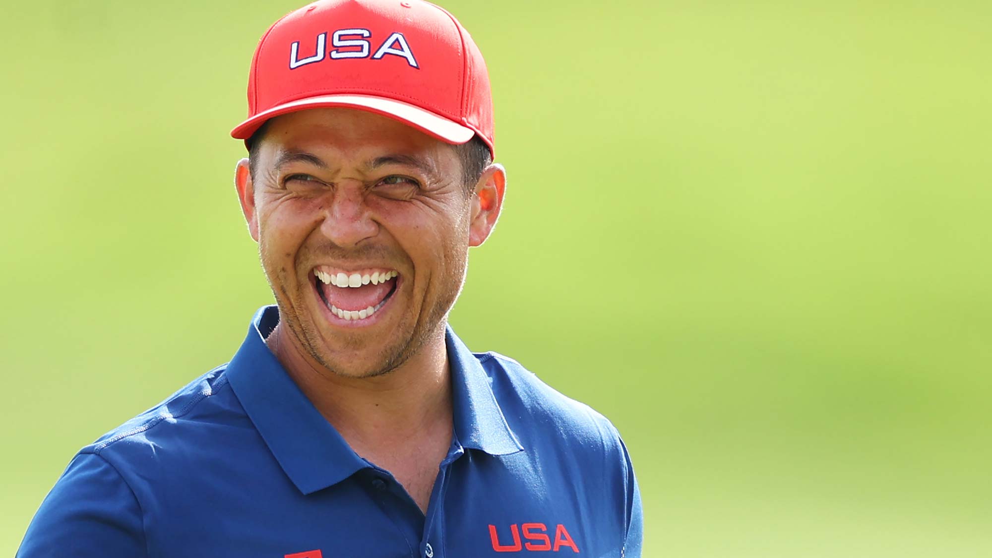 Xander Schauffele of Team United States laughs during Day Three of the Men's Individual Stroke Play on day eight of the Olympic Games Paris 2024 at Le Golf National 