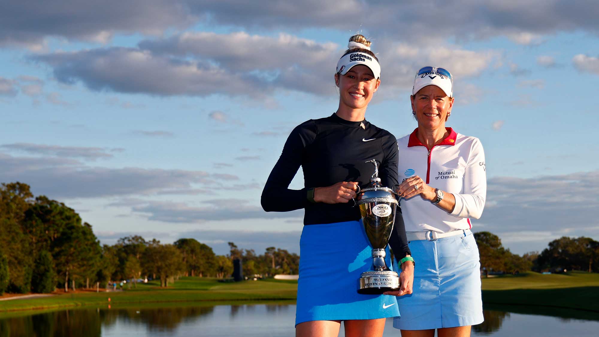 Nelly Korda (of the United States and tournament host Annika Sorenstam of Sweden pose with with the winner's trophy after winning The ANNIKA driven by Gainbridge at Pelican 2024 at Pelican Golf Club on November 17, 2024 in Belleair, Florida. 