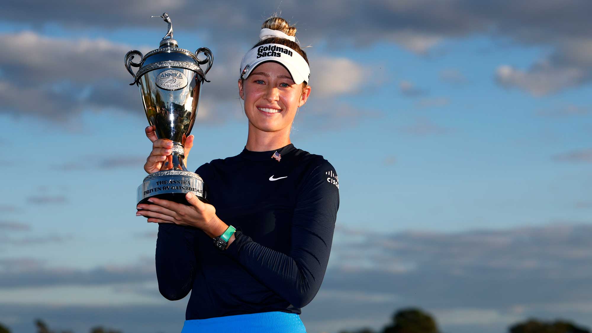 Nelly Korda of the United States poses with the winner's trophy after winning The ANNIKA driven by Gainbridge at Pelican 2024 at Pelican Golf Club on November 17, 2024 in Belleair, Florida.