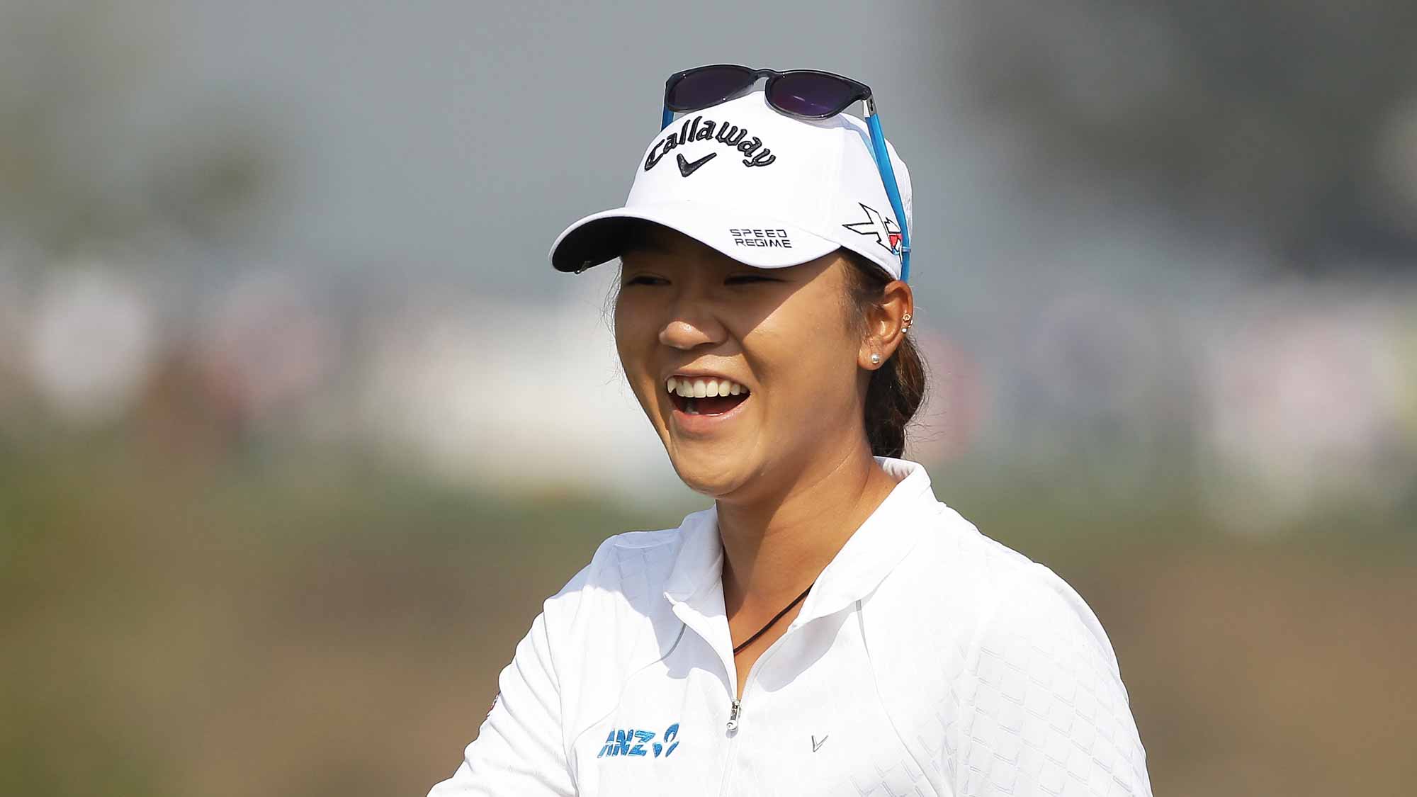 Lydia Ko of New Zealand reacts before a putt on the 6th green during round three of the LPGA KEB Hana Bank