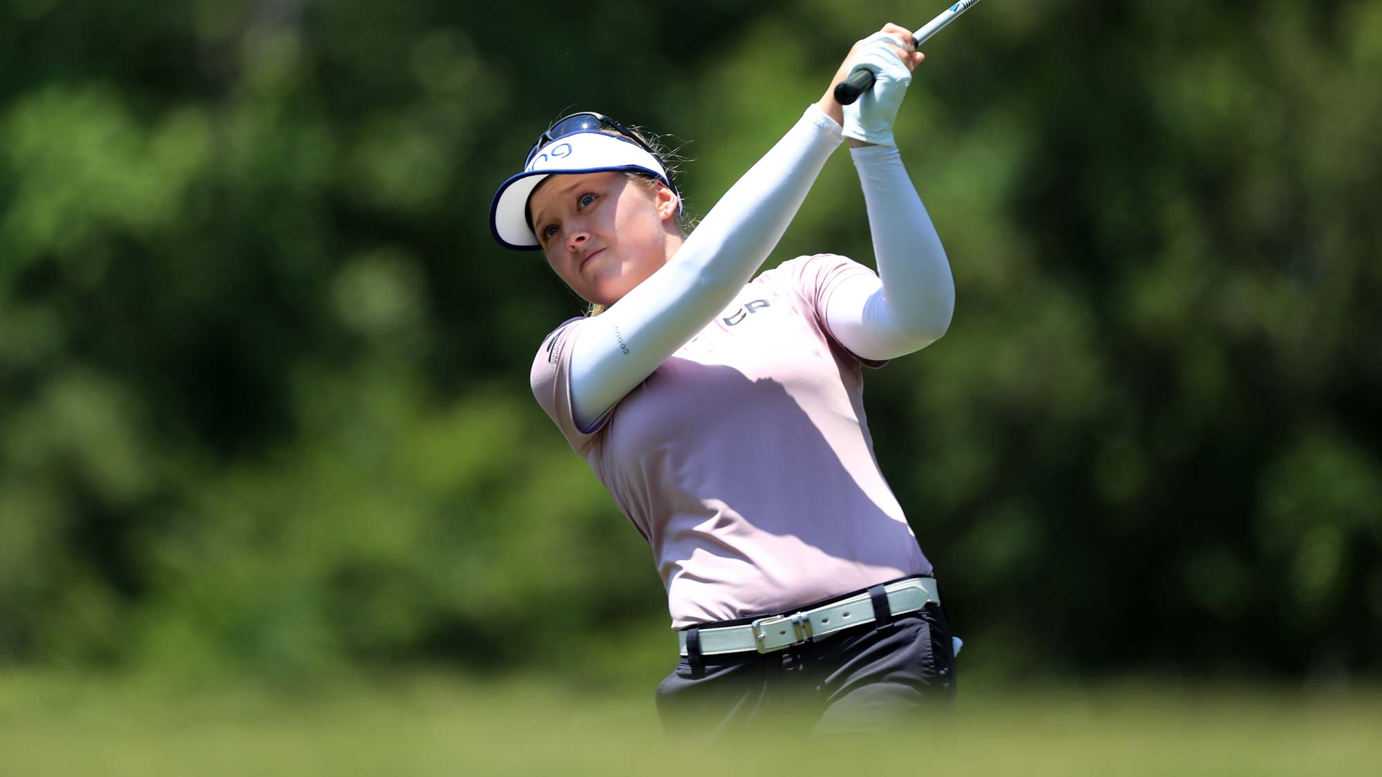 Brooke M. Henderson hits her tee shot on the fourth hole during the third round of the Pure Silk Championship