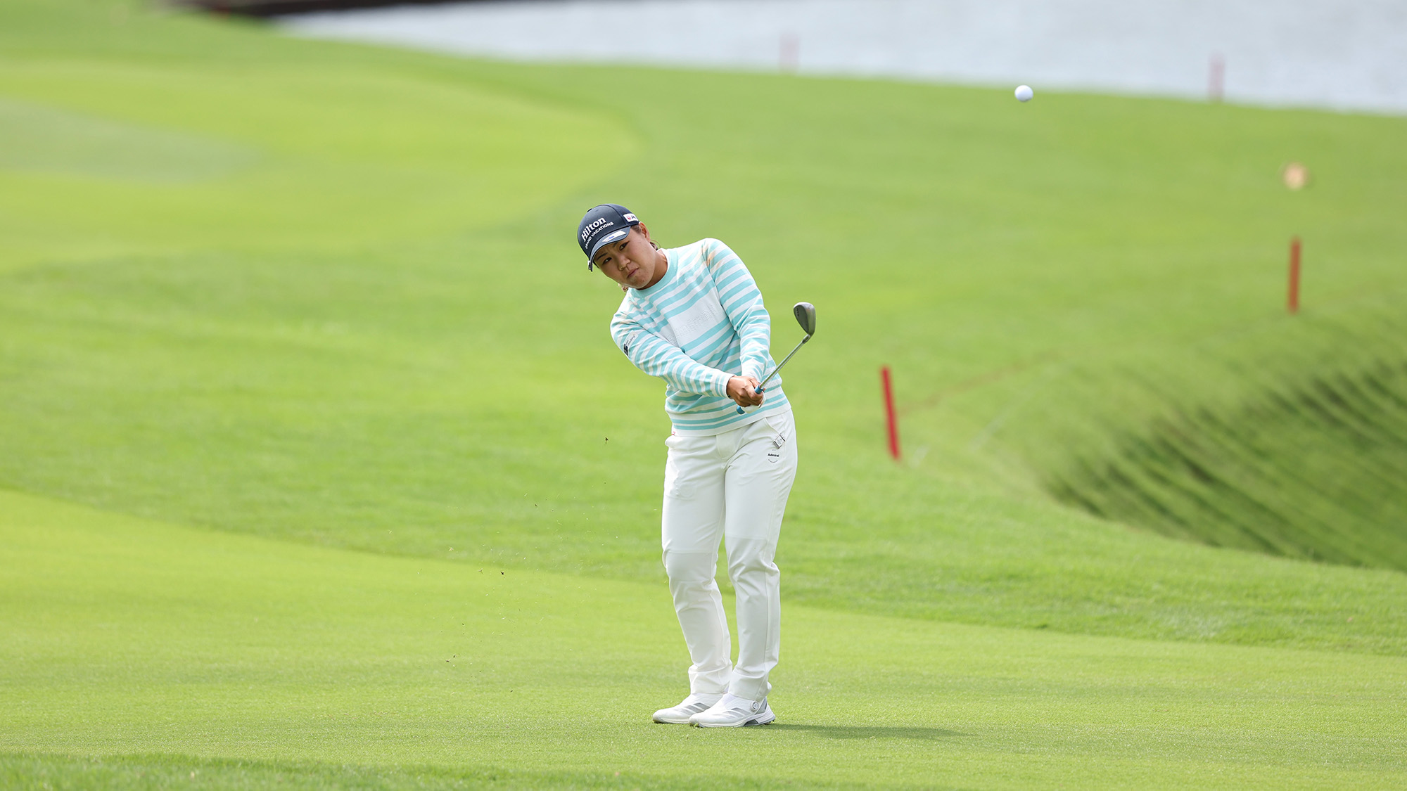 Nasa Hataoka of Japan plays her shot on the 18th hole during the second round of the Blue Bay LPGA 2025 at Jian Lake Blue Bay Golf Course on March 07, 2025 in Hainan Island, China.