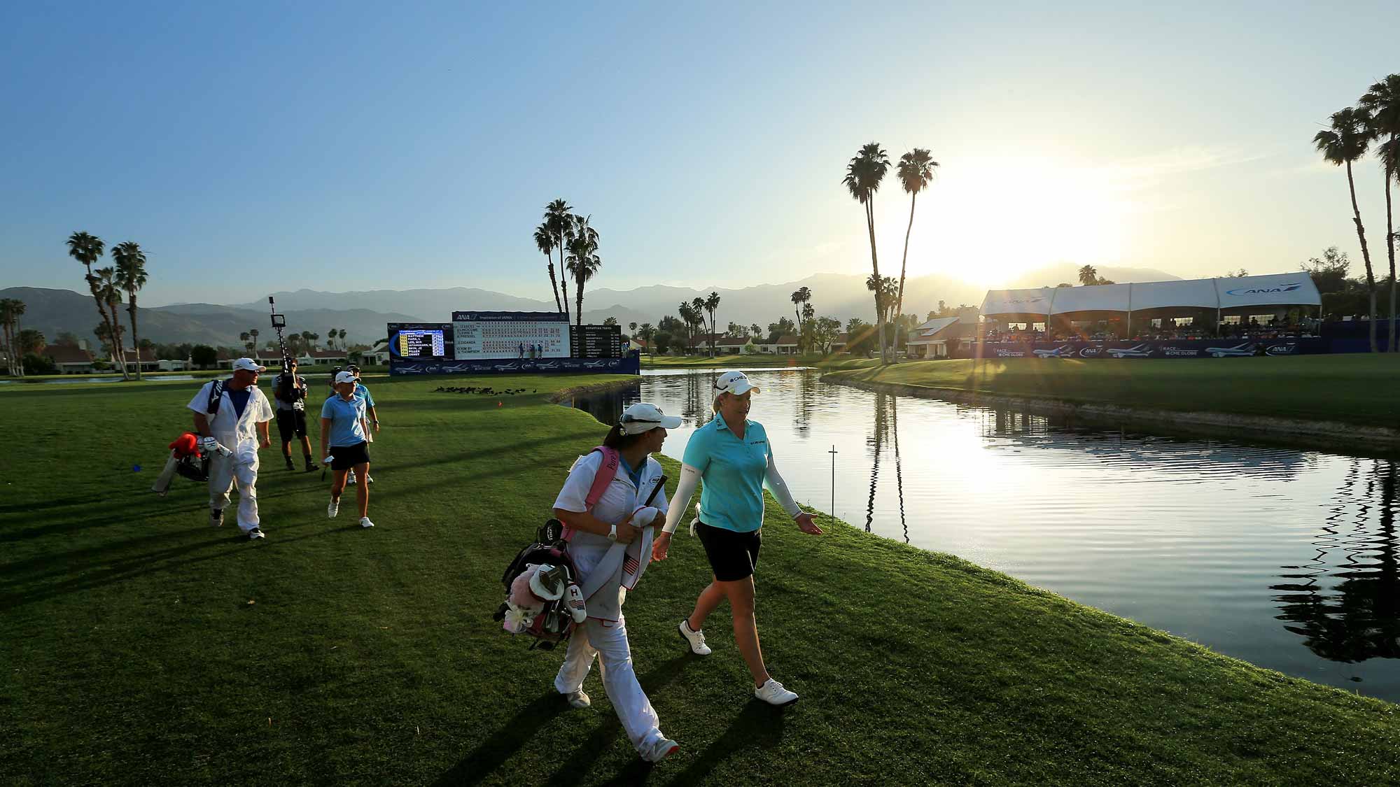 Brittany Lincicome of the USA walks ahead of Stacy Lewis to the 18th green during their sudden death play-off in the final round of the ANA Inspiration