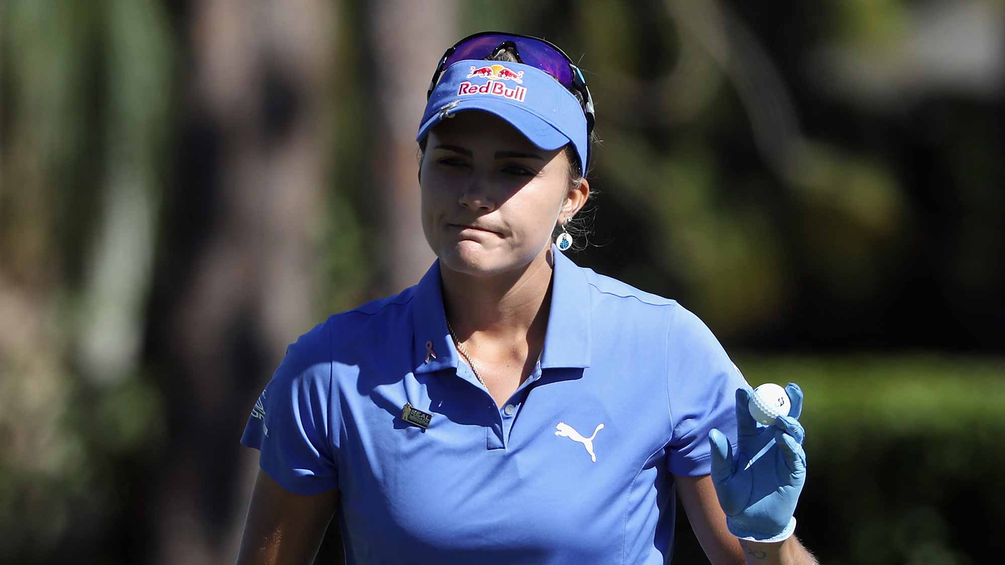 Lexi Thompson of the United States reacts after putting for birdie on the sixth green during the final round of the CME Group Tour Championship