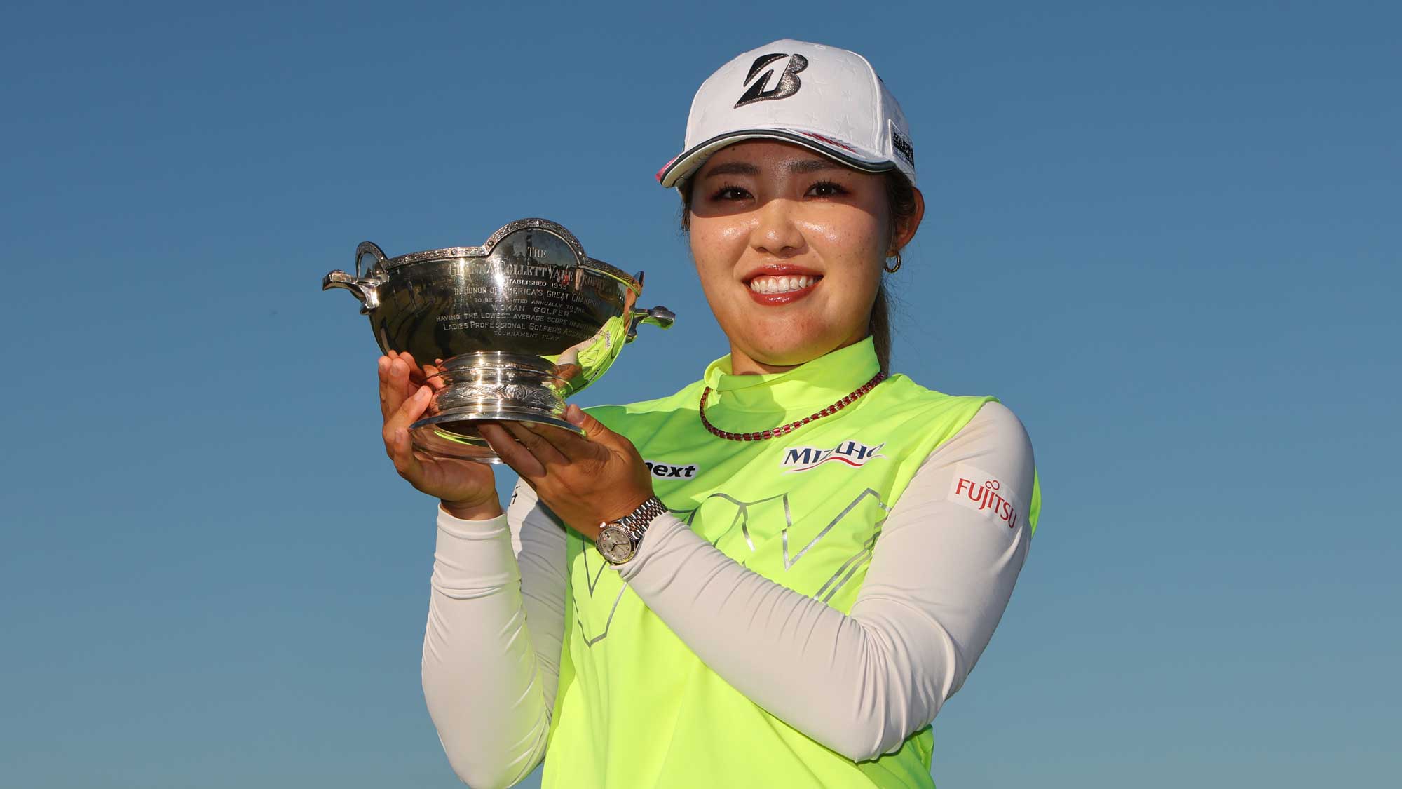 Ayaka Furue of Japan poses with the Glenna Collett Vare Trophy after the final round of the CME Group Tour Championship 2024 at Tiburon Golf Club on November 24, 2024 in Naples, Florida.