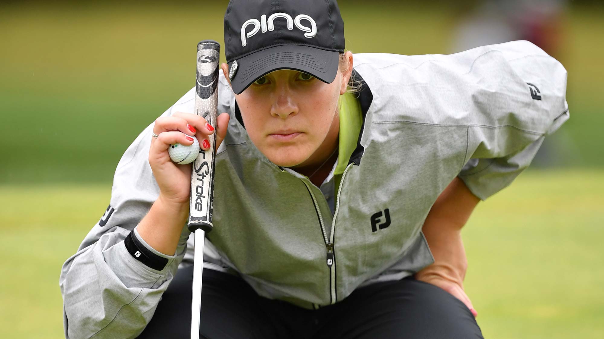 Jennifer Kupcho of the USA lines up her putt on the 11th hole during day 4 of the Evian Championship