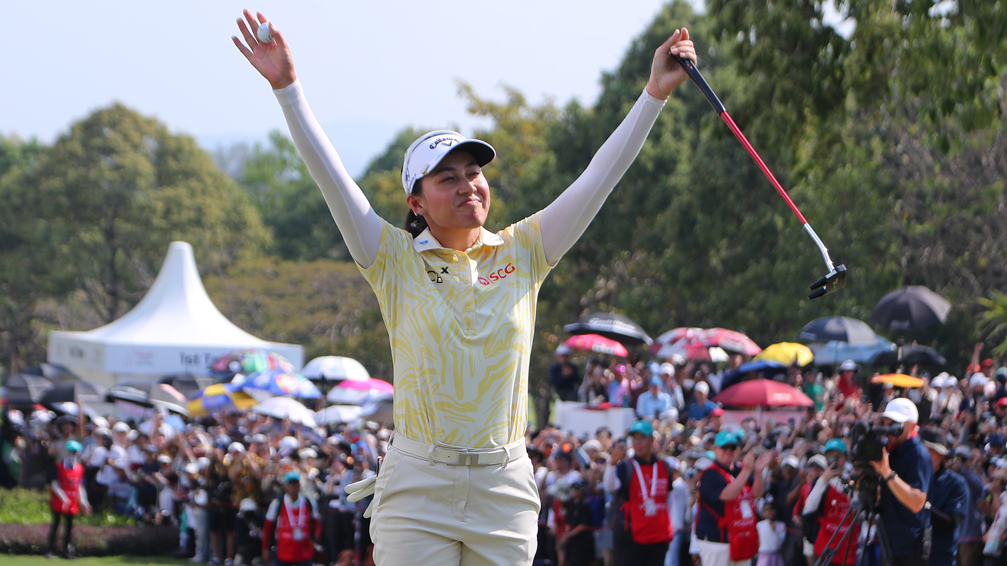 Jeeno Thitikul of Thailand acknowledges the gallery following victory in the final round of the Honda LPGA Thailand 2026 at Siam Country Club on February 22, 2026 in Chon Buri, Thailand.