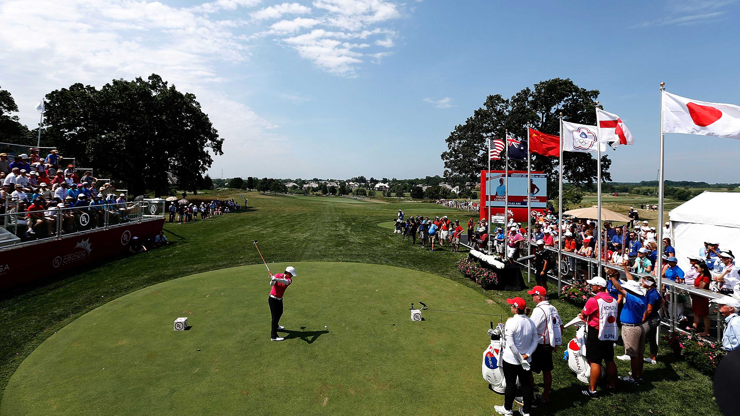 Haru Nomura of Japan hits her tee shot on the first hole during the singles matches of the 2016 UL International Crown