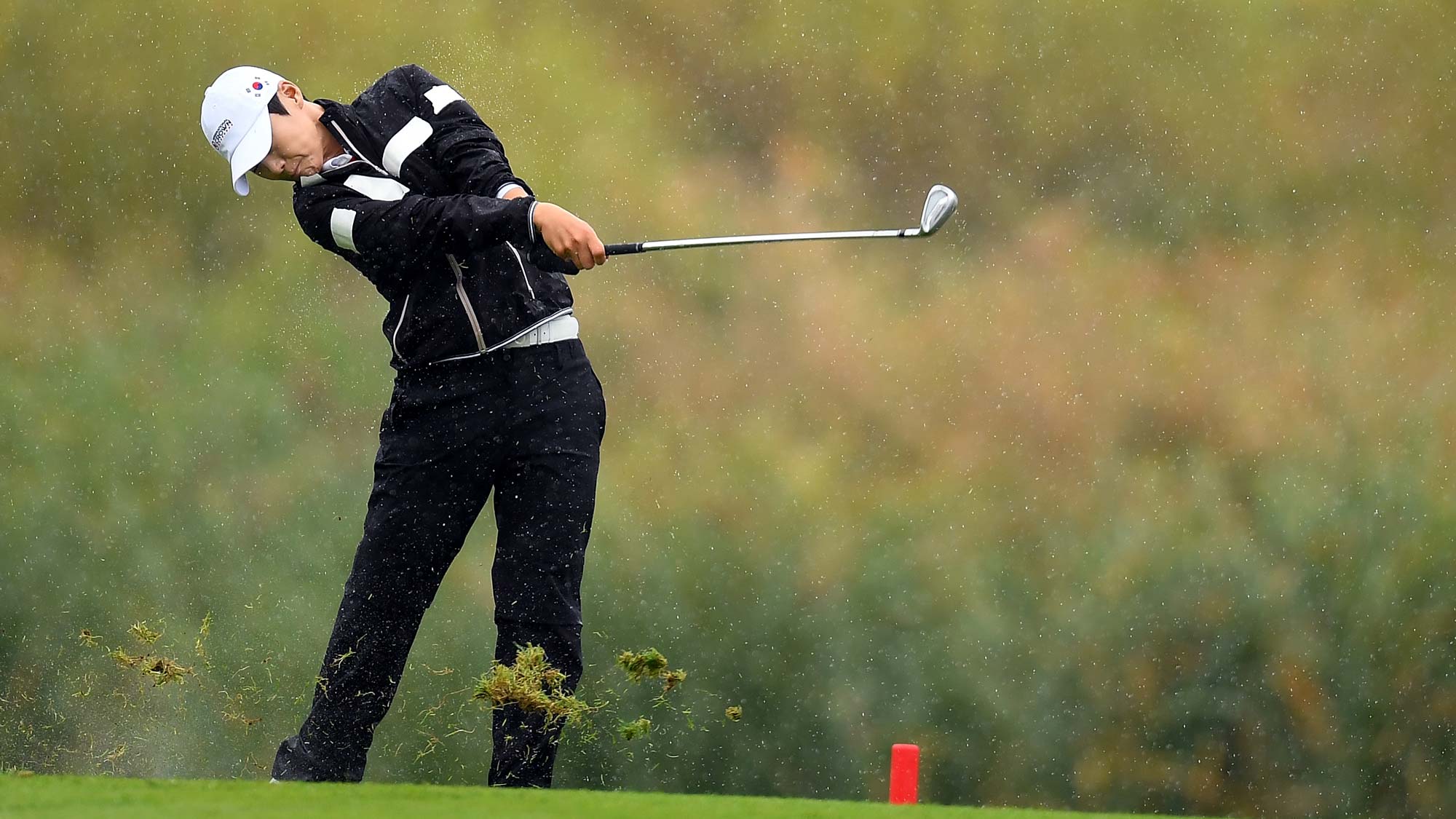 Sung Hyun Park of South Korea hits her second shot on the 4th hole in the Pool A match between South Korea and Australia on day two of the UL International Crown