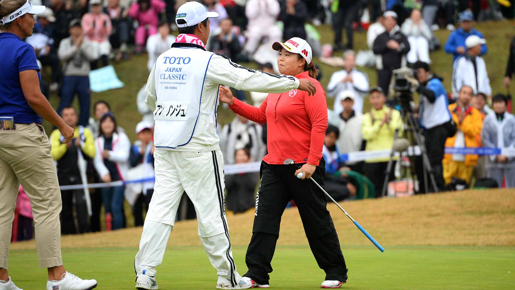 Sun-Ju Ahn of South Korea celebrates after winning putt on the 18th green during the third round of the TOTO JAPAN CLASSIC