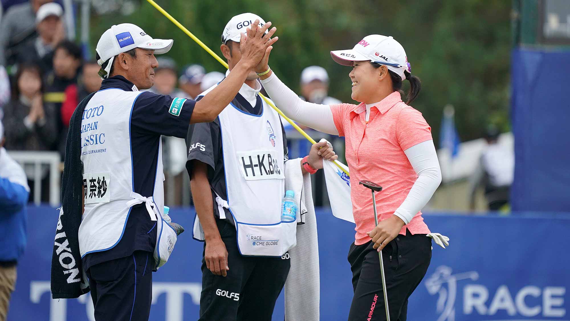 Nasa Hataoka of Japan celebrates on the 18th green after winning the TOTO Japan Classic at Seta Golf Course on November 04, 2018 in Otsu, Shiga, Japan