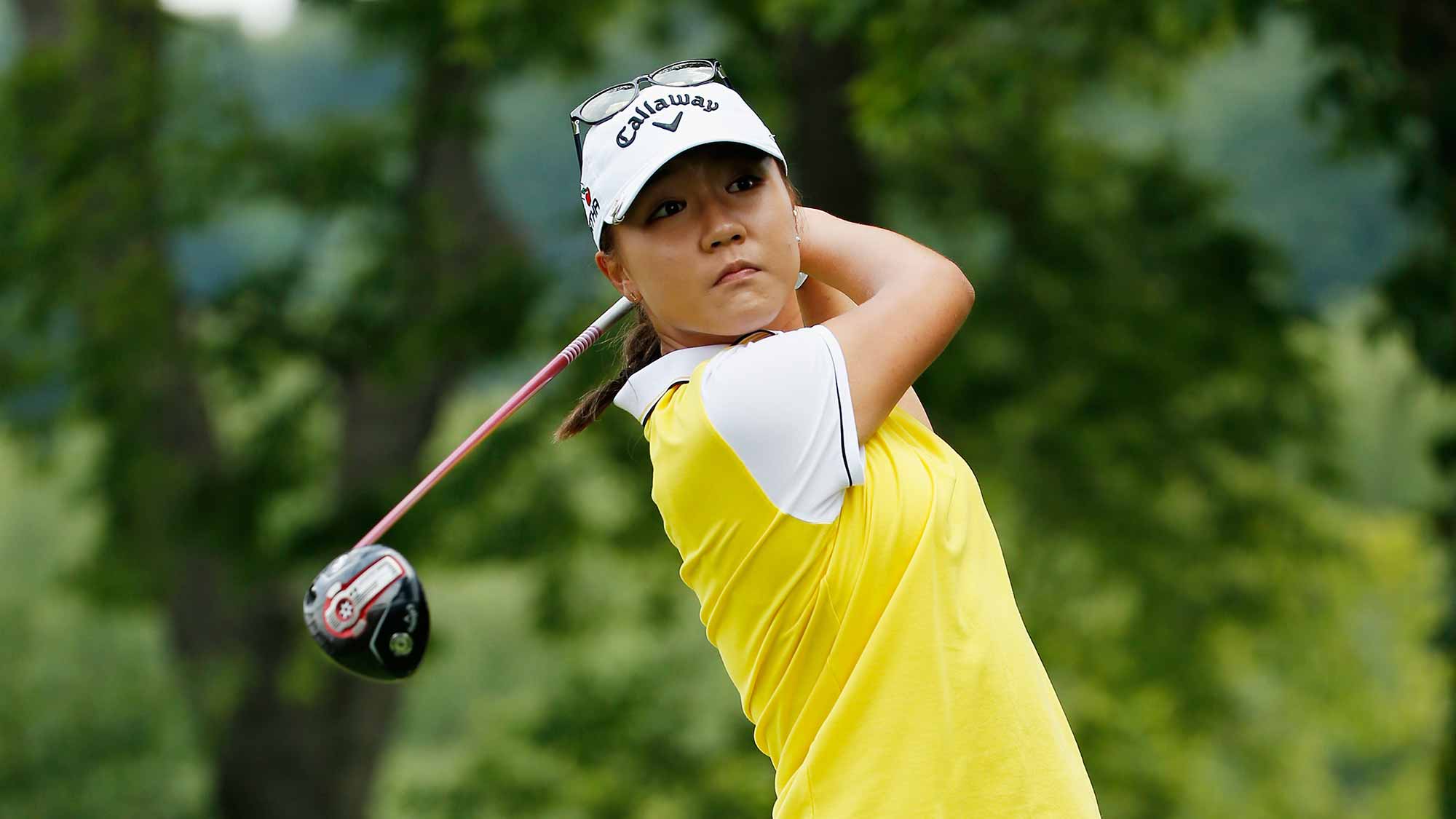 Lydia Ko of New Zealand watches her tee shot on the second hole during the final round of the U.S. Women's Open at Lancaster Country Club