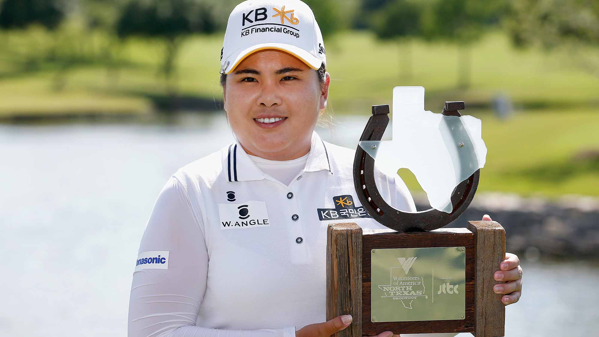 Inbee Park of South Korea poses with the trophy after winning the Final Round of the 2015 Volunteers of America North Texas Shootout Presented by JTBC