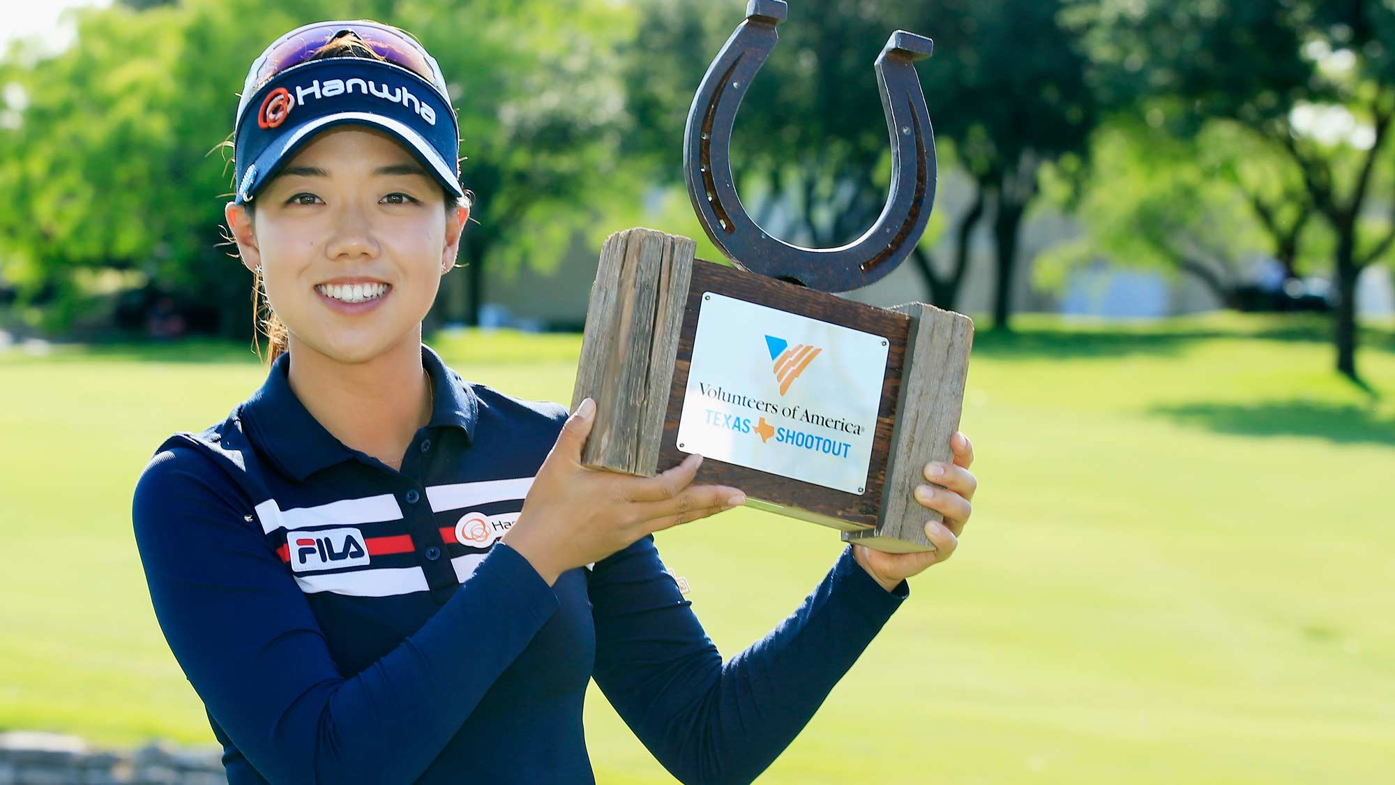 Jenny Shin poses with the trophy after her two-stroke victory at the ...
